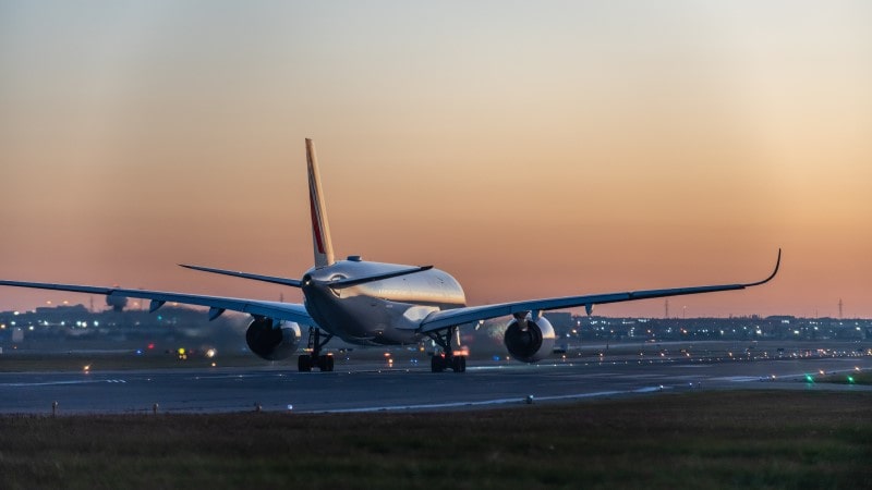 Airplane taxiing on runway