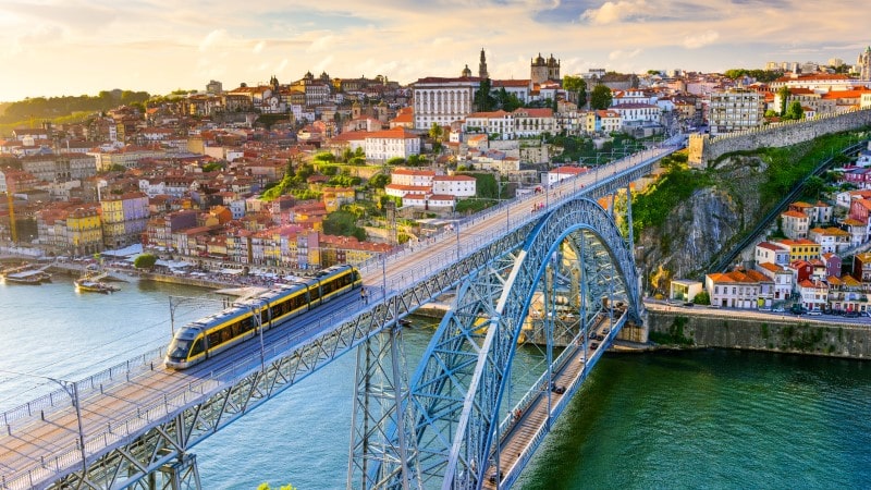 Cityscape view of the Douro River and Dom Luis I bridge in Porto