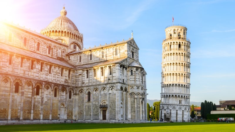 Sunset view of the Leaning Tower of Pisa and cathedral in Tuscany