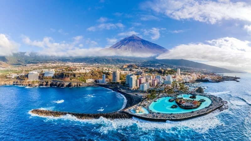 Aerial view of Puerto de la Cruz with Mount Teide in the background