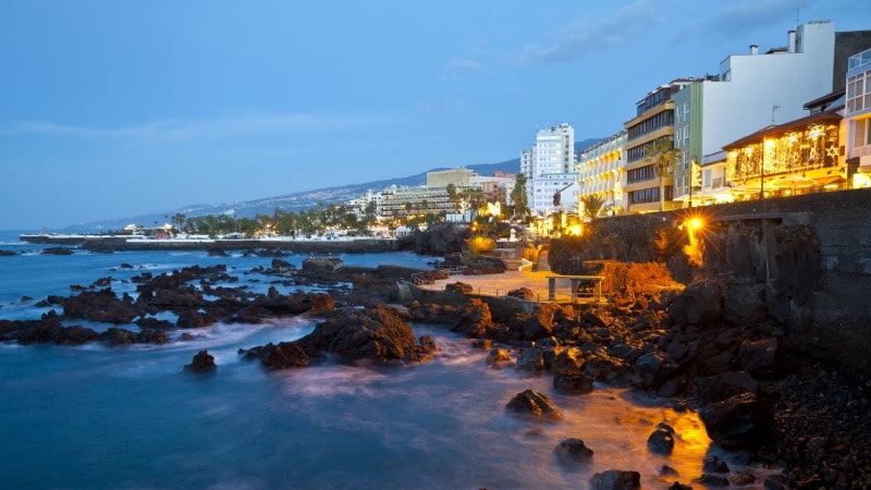 View of the coastal town of Puerto de la Cruz at night
