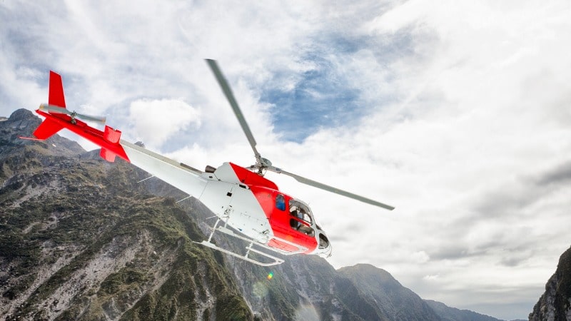 Helicopter flying over the Southern Alps, New Zealand