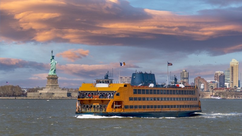 Staten Island ferry sailing past the Statue of Liberty