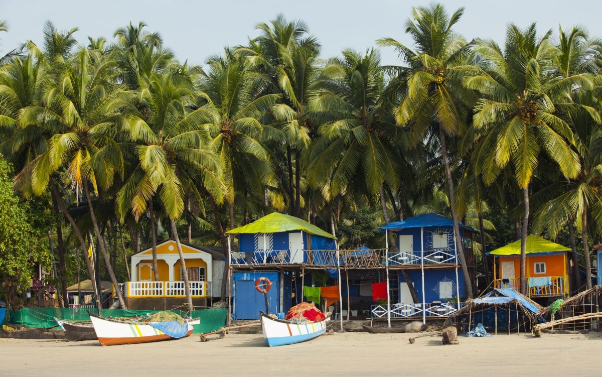 Palolem Beach houses and boats in Goa, India