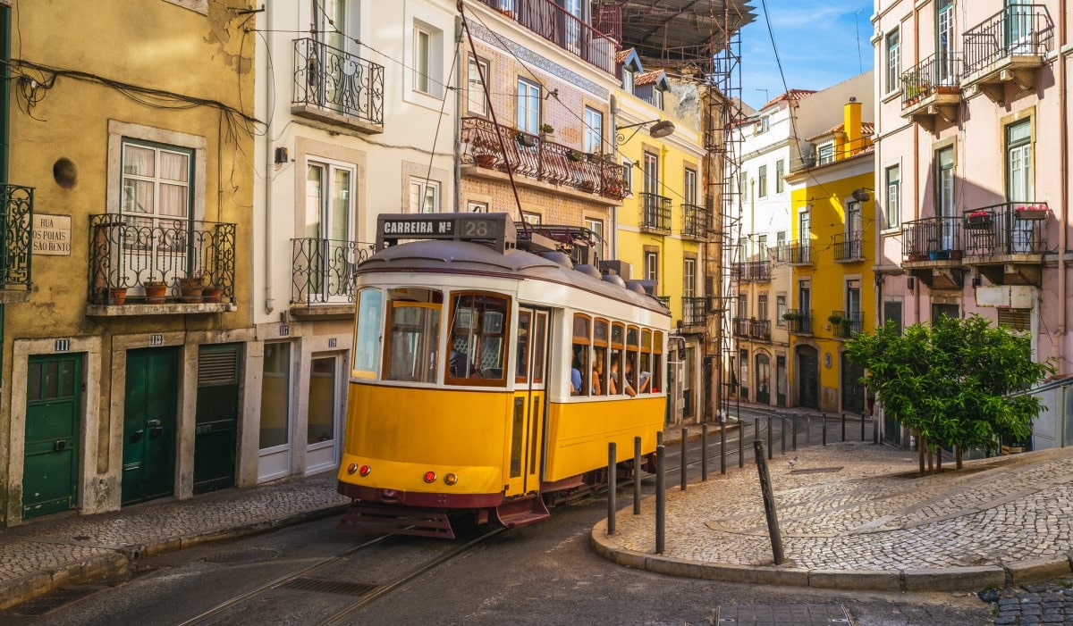 Tram going through the streets of Lisbon