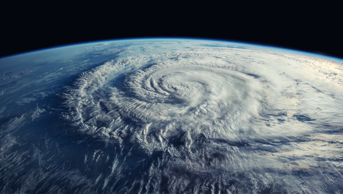 Tropical storm cloud formation over water, viewed from outer space